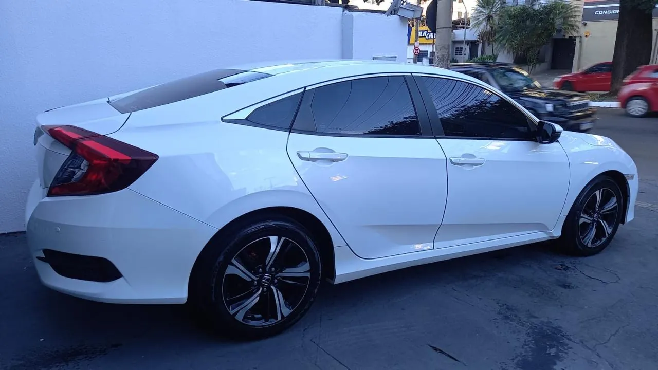 
								Honda Civic EX 2.0 total									