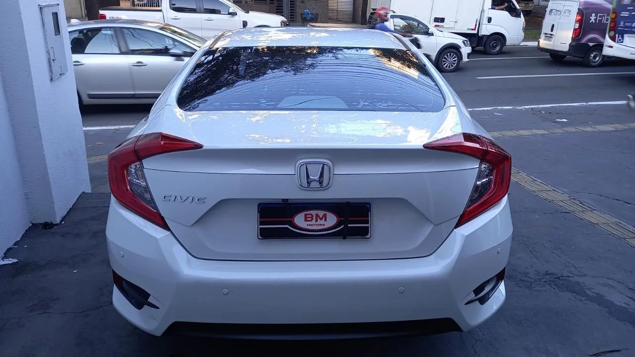 
								Honda Civic EX 2.0 total									