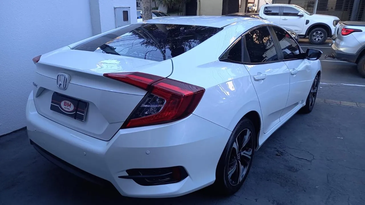 
								Honda Civic EX 2.0 total									