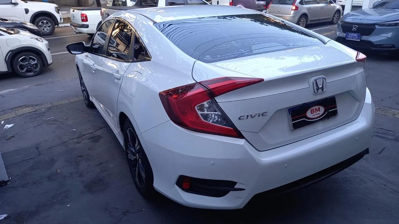 
								Honda Civic EX 2.0 total									